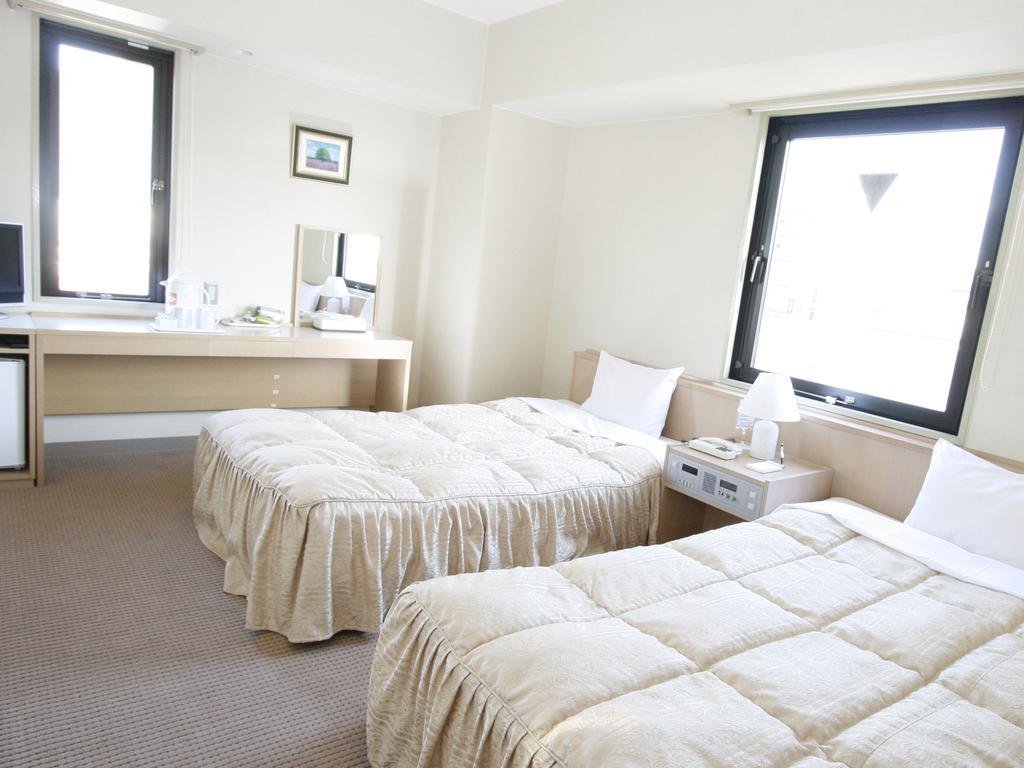 Hotel Pearl City Tendo Bagian luar foto
